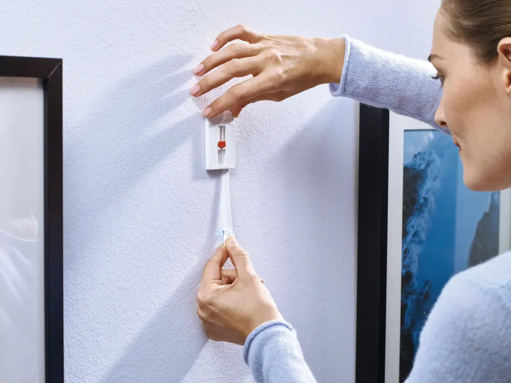 Tesa Tesa - Adjustable self-adhesive nail for all types of wall (max 2x2kg)