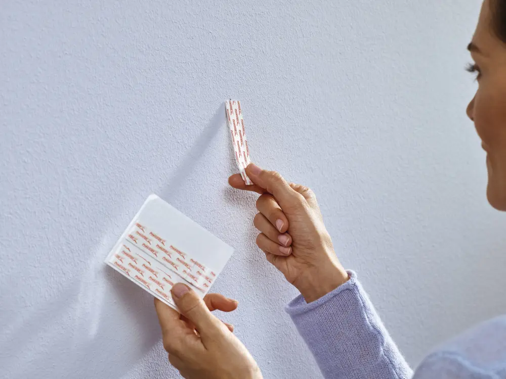 Tesa Tesa - Adjustable self-adhesive nail for all types of wall (max 2x2kg)