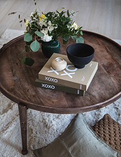 Coffee table photo album on a living room table